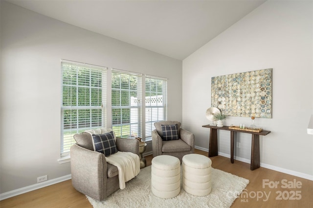10225 Alexander Martin Ave, Charlotte, NC 28277 - sitting room featuring wood finished floors, healthy amount of natural light, and vaulted ceiling