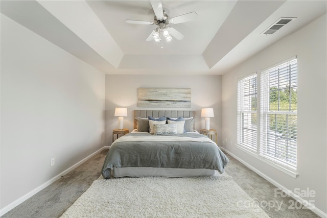 10225 Alexander Martin Ave, Charlotte, NC 28277 - bedroom featuring carpet, a tray ceiling, and ceiling fan