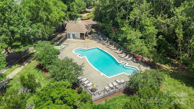 10225 Alexander Martin Ave, Charlotte, NC 28277 - aerial view of property and surrounding area featuring a pool area