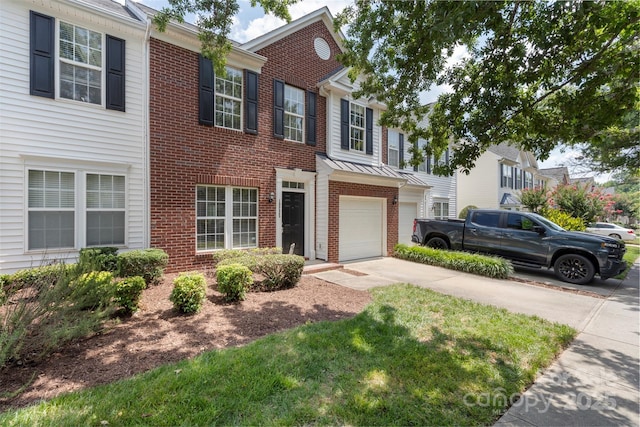 10225 Alexander Martin Ave, Charlotte, NC 28277 - townhome / multi-family property featuring concrete driveway, brick siding, and an attached garage