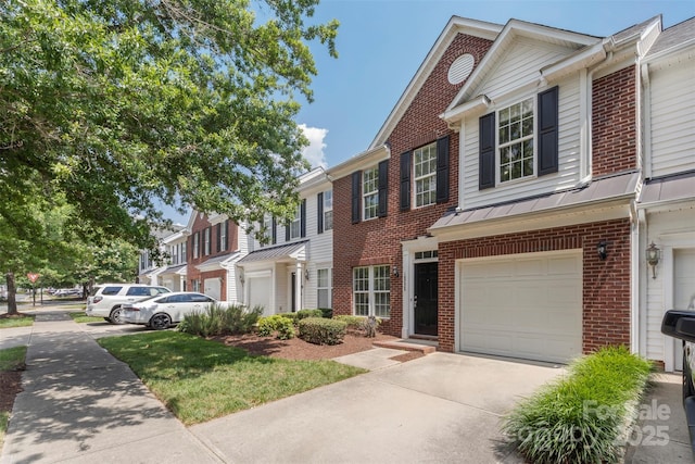 10225 Alexander Martin Ave, Charlotte, NC 28277 - multi unit property featuring brick siding, an attached garage, a standing seam roof, concrete driveway, and a metal roof