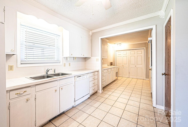 2031 36th St NE, Hickory, NC 28601 - kitchen featuring white dishwasher, a sink, a textured ceiling, white cabinetry, and ornamental molding