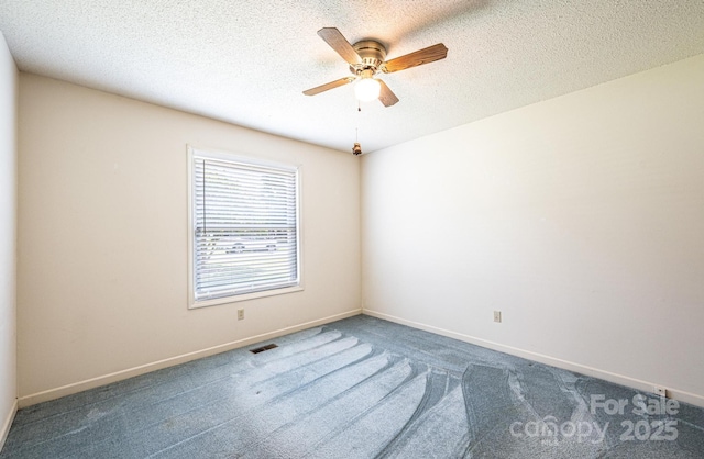 2031 36th St NE, Hickory, NC 28601 - carpeted spare room with ceiling fan, baseboards, and a textured ceiling