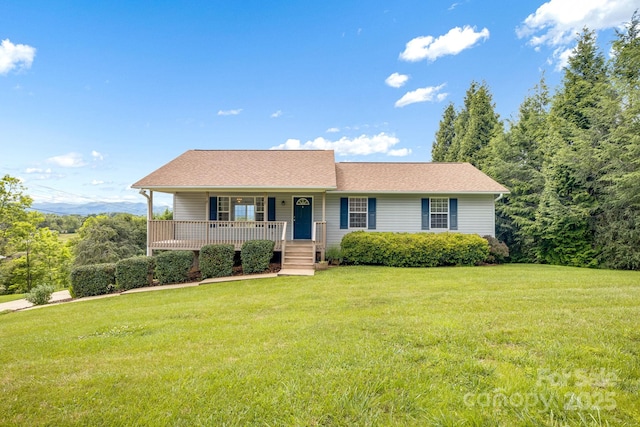 87 Collins Rd, Marshall, NC 28753 - view of front of property with a porch, a front yard, and roof with shingles