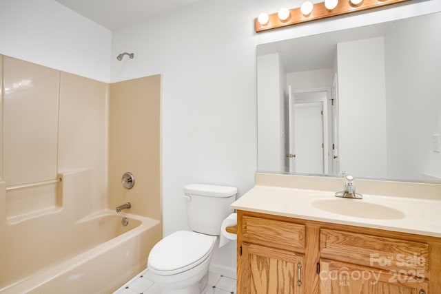 87 Collins Rd, Marshall, NC 28753 - full bathroom with vanity, toilet, washtub / shower combination, tile patterned floors, and baseboards