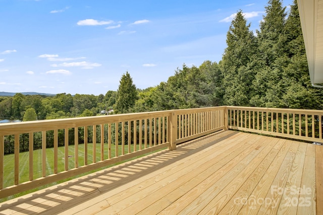 87 Collins Rd, Marshall, NC 28753 - wooden deck with a yard and a view of trees