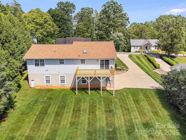 87 Collins Rd, Marshall, NC 28753 - back of property with a lawn and a wooden deck