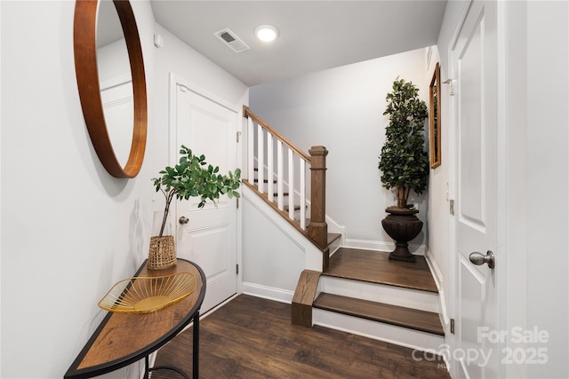1428 Winding Stream Rd, Charlotte, NC 28206 - entrance foyer featuring dark wood finished floors, stairway, and baseboards
