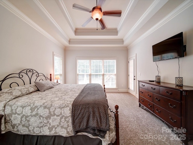 8101 Cane Pointe Ln, Waxhaw, NC 28173 - bedroom featuring a raised ceiling, light carpet, crown molding, and a ceiling fan