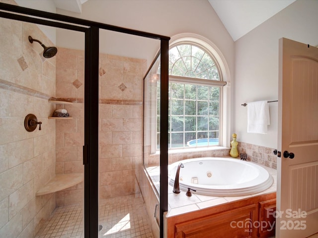 8101 Cane Pointe Ln, Waxhaw, NC 28173 - bathroom with lofted ceiling, a jetted tub, and a stall shower