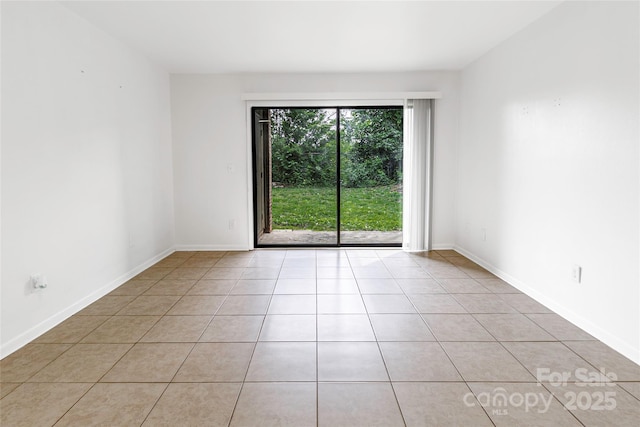 326 Orchard Trace Ln Unit 3, Charlotte, NC 28213 - empty room with light tile patterned floors and baseboards