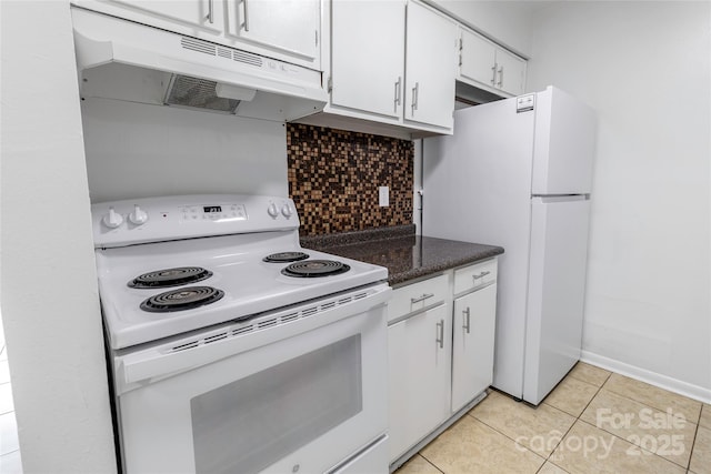 326 Orchard Trace Ln Unit 3, Charlotte, NC 28213 - kitchen with white appliances, under cabinet range hood, white cabinets, tasteful backsplash, and light tile patterned flooring
