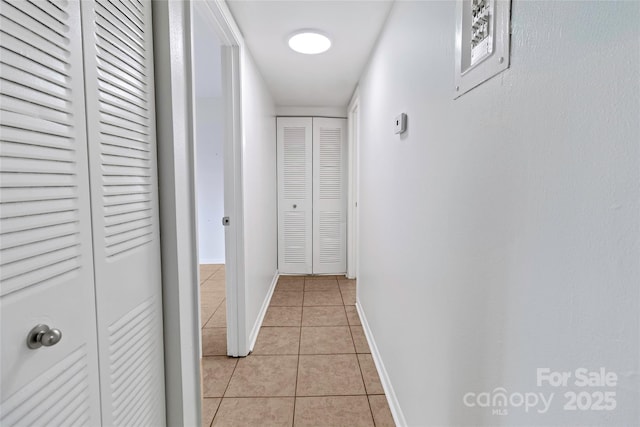 326 Orchard Trace Ln Unit 3, Charlotte, NC 28213 - corridor with light tile patterned floors and baseboards