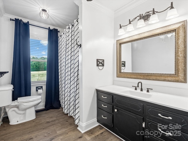 1238 Carl Allen Rd, Edgemoor, SC 29712 - bathroom featuring toilet, crown molding, vanity, wood finished floors, and baseboards