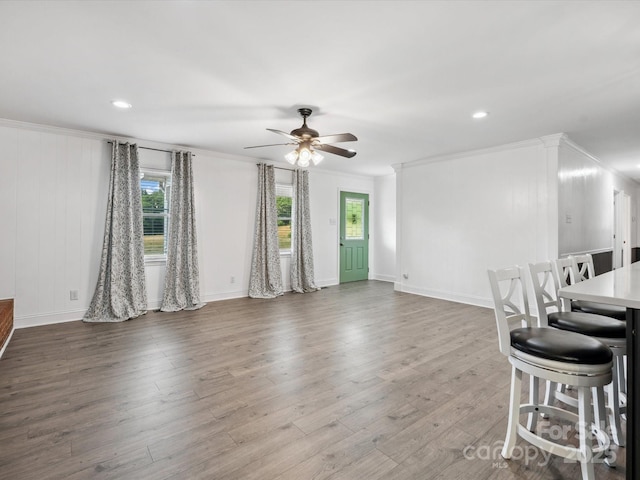 1238 Carl Allen Rd, Edgemoor, SC 29712 - unfurnished living room with a ceiling fan, wood finished floors, crown molding, and recessed lighting