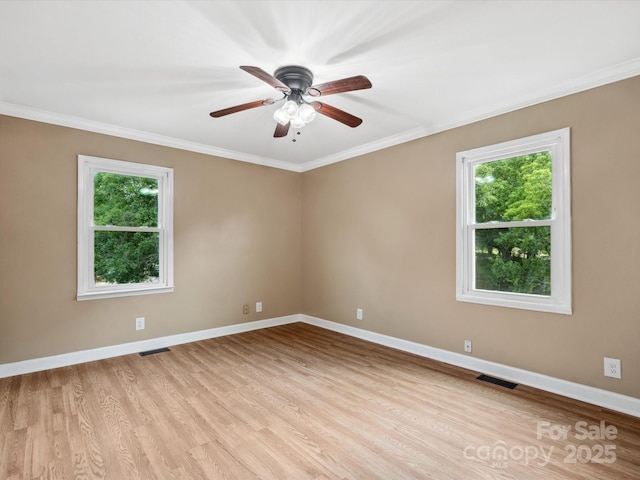 1238 Carl Allen Rd, Edgemoor, SC 29712 - empty room featuring plenty of natural light, crown molding, light wood finished floors, and ceiling fan