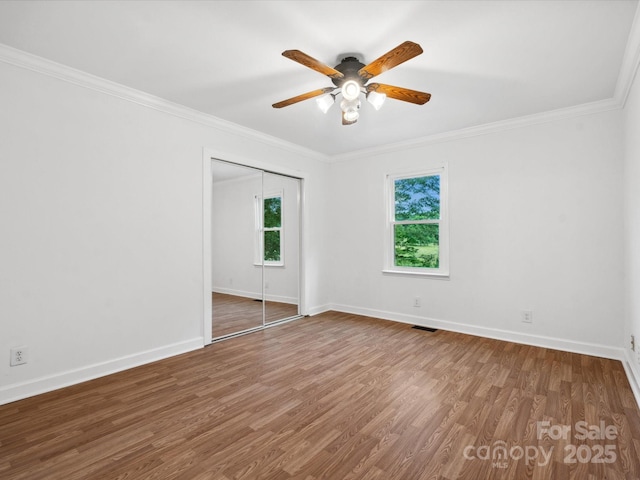 1238 Carl Allen Rd, Edgemoor, SC 29712 - empty room featuring wood finished floors, a ceiling fan, and ornamental molding