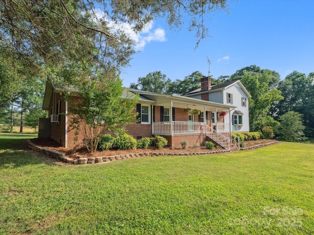 1238 Carl Allen Rd, Edgemoor, SC 29712 - view of front of house with covered porch, brick siding, a front yard, and a chimney
