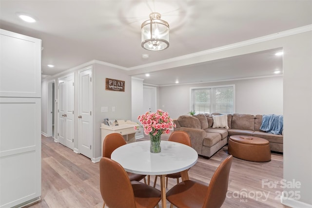 4410 Burgin St, Kannapolis, NC 28081 - dining space featuring light wood finished floors, crown molding, and recessed lighting