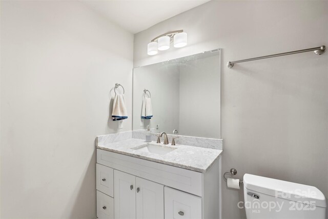 4410 Burgin St, Kannapolis, NC 28081 - half bathroom featuring vanity and toilet