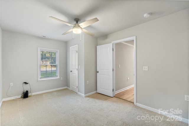 4410 Burgin St, Kannapolis, NC 28081 - unfurnished bedroom with carpet and ceiling fan