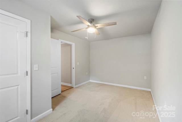 4410 Burgin St, Kannapolis, NC 28081 - unfurnished bedroom featuring carpet flooring and a ceiling fan