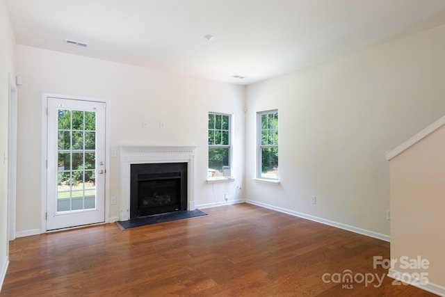 2180 Shady Pond Dr, Clover, SC 29710 - unfurnished living room featuring wood finished floors, a fireplace, and baseboards