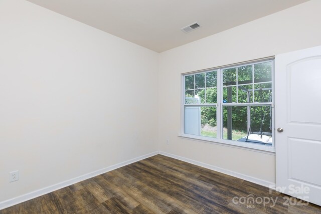 2180 Shady Pond Dr, Clover, SC 29710 - empty room featuring dark wood-style floors and baseboards