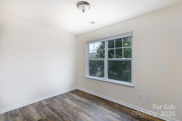 2180 Shady Pond Dr, Clover, SC 29710 - empty room featuring dark wood-style flooring and baseboards