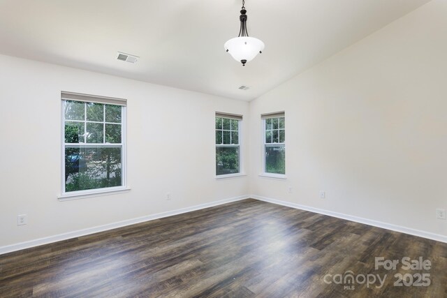 2180 Shady Pond Dr, Clover, SC 29710 - empty room featuring dark wood-type flooring, baseboards, and lofted ceiling