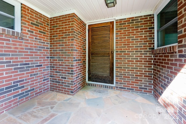3420 Long Ferry Rd, Salisbury, NC 28146 - view of exterior entry featuring brick siding and a porch