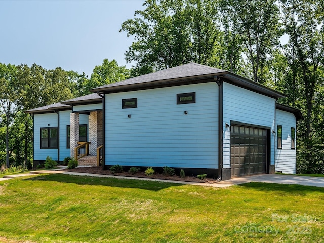 2004 Plain Field Dr, Bessemer City, NC 28016 - view of front of house with a front lawn and driveway