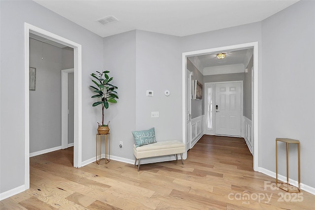 8722 Heron Glen Dr, Charlotte, NC 28269 - foyer featuring light wood-style flooring and baseboards