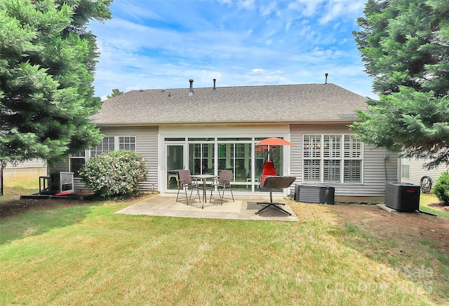 8722 Heron Glen Dr, Charlotte, NC 28269 - rear view of house with a yard, central AC, and a patio