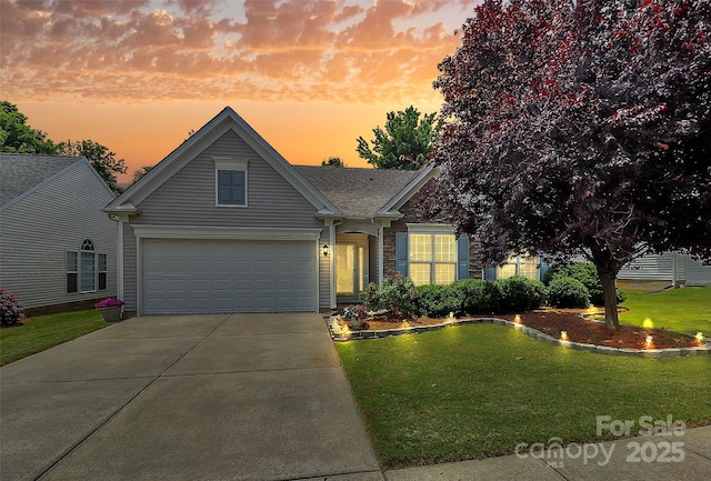 8722 Heron Glen Dr, Charlotte, NC 28269 - view of front facade featuring a yard, driveway, and an attached garage
