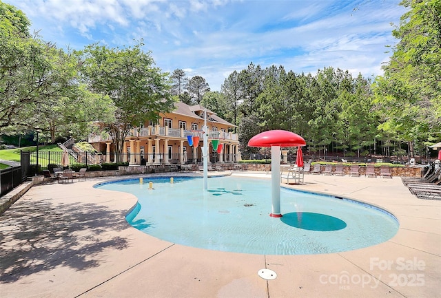 8722 Heron Glen Dr, Charlotte, NC 28269 - community pool with a patio and view of scattered trees