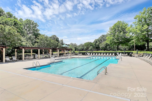 8722 Heron Glen Dr, Charlotte, NC 28269 - community pool with a patio, view of scattered trees, and a gazebo