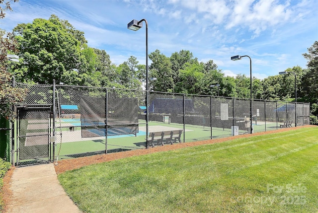 8722 Heron Glen Dr, Charlotte, NC 28269 - view of tennis court with a gate