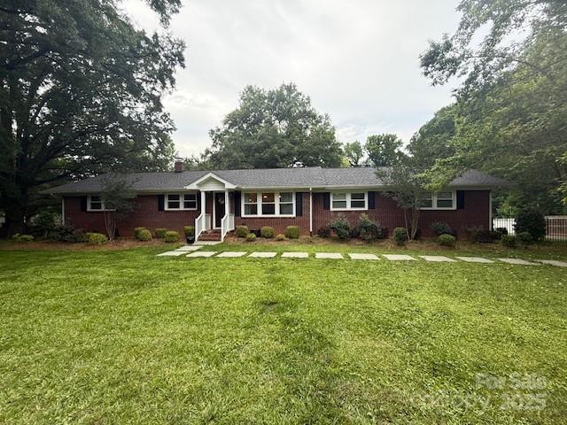 3250 Celanese Rd, Rock Hill, SC 29732 - ranch-style house with a front yard and a chimney