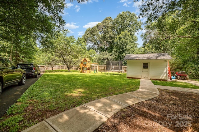 3250 Celanese Rd, Rock Hill, SC 29732 - view of yard featuring a trampoline, a playground, an outbuilding, and view of scattered trees