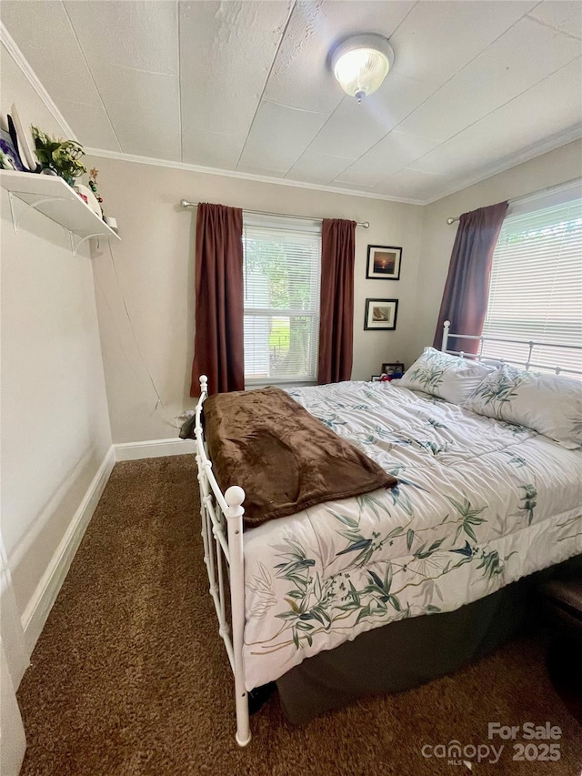 106 Peacock Ave, Lexington, NC 27292 - carpeted bedroom with crown molding and baseboards
