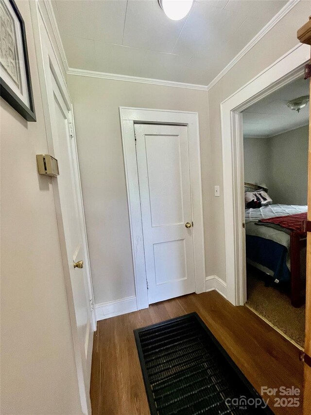 106 Peacock Ave, Lexington, NC 27292 - hallway featuring wood finished floors, baseboards, and ornamental molding
