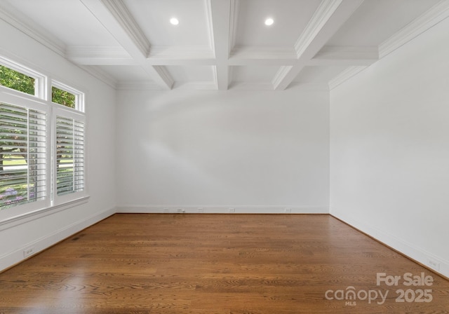 1108 Shinnecock Ln, Waxhaw, NC 28173 - empty room with beamed ceiling, crown molding, coffered ceiling, and wood finished floors