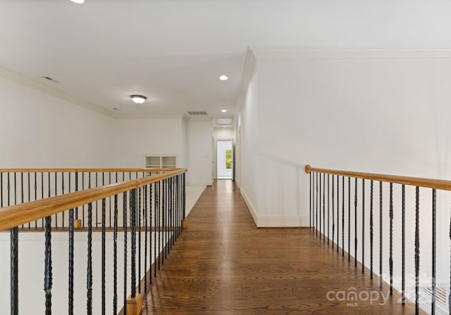 1108 Shinnecock Ln, Waxhaw, NC 28173 - hall featuring wood finished floors, ornamental molding, and recessed lighting