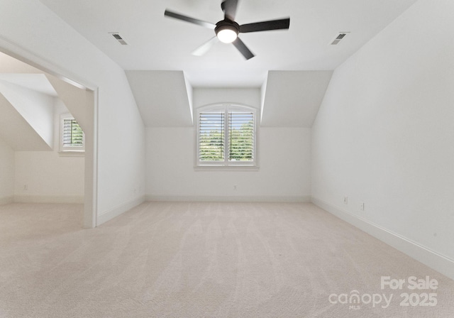 1108 Shinnecock Ln, Waxhaw, NC 28173 - additional living space featuring plenty of natural light, lofted ceiling, ceiling fan, and carpet flooring