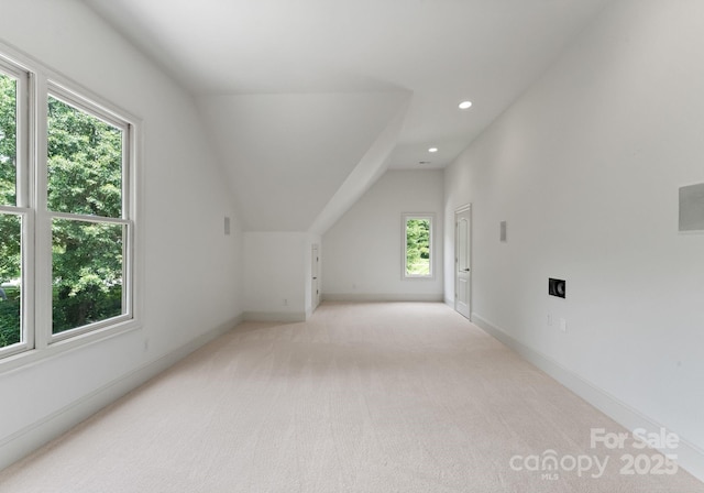 1108 Shinnecock Ln, Waxhaw, NC 28173 - bonus room featuring light carpet, vaulted ceiling, and recessed lighting