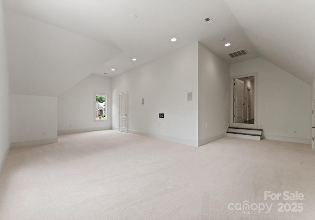 1108 Shinnecock Ln, Waxhaw, NC 28173 - bonus room with vaulted ceiling, light carpet, and recessed lighting