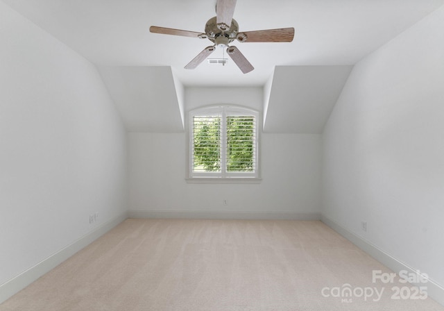1108 Shinnecock Ln, Waxhaw, NC 28173 - bonus room with lofted ceiling, carpet, and a ceiling fan