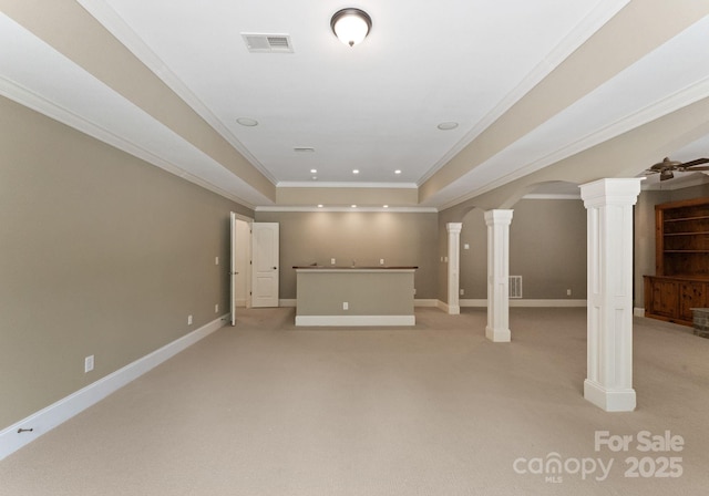 1108 Shinnecock Ln, Waxhaw, NC 28173 - basement with crown molding, light colored carpet, recessed lighting, and arched walkways