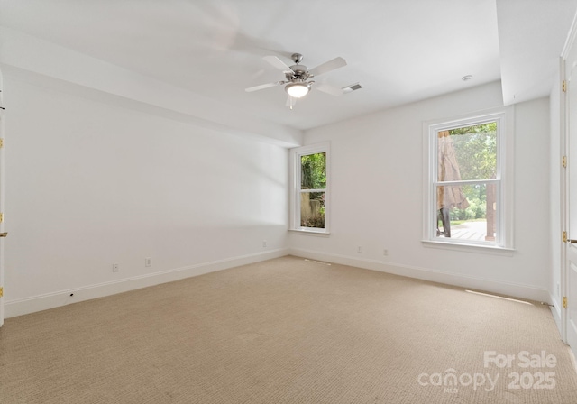 1108 Shinnecock Ln, Waxhaw, NC 28173 - spare room featuring a ceiling fan and light colored carpet